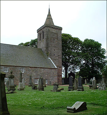 "In loving memory of Peggy Auchterlonie or Birrell, who died 16th Feb 1894 aged 82 years" The small gravestone lies in the foreground at Crail churchyard.